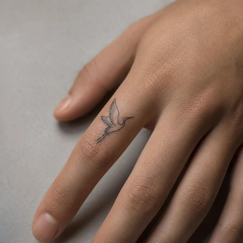 finger-tattoo neo-traditional feder
